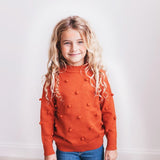 Rust Pom-Pom Sweater